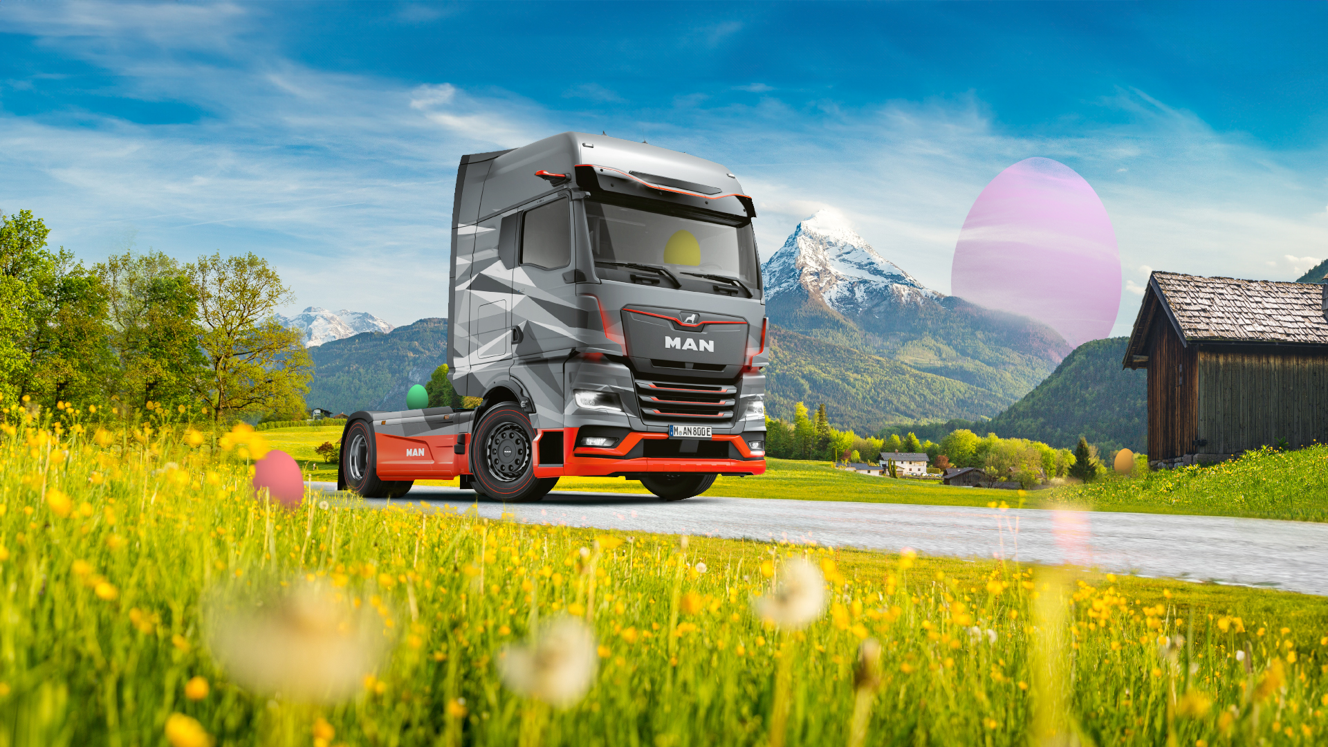 LKW auf einer Straße in einer sommerlichen Naturlandschaft, in der Ostereier versteckt sind